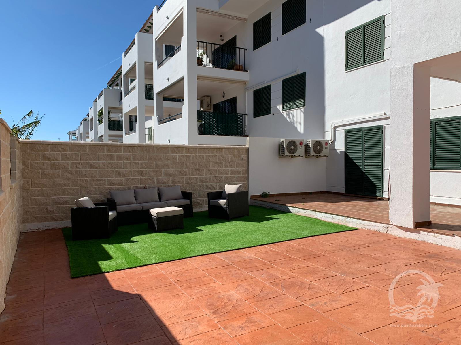 Bajo con jardín de 2 dormitorios y 1 baño en la urbanización Almadraba Playa en Atlanterra - Fotografía inmueble